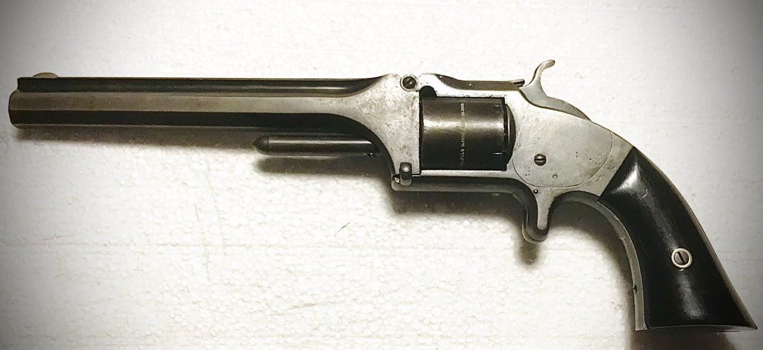 Very very early smith and Wesson army revolver: You will be hard pressed to find another Civil War Smith and Wesson earlier than this one. This number two army model bears serial number 138 on bottom strap and back face of barrel. The cylinder has
