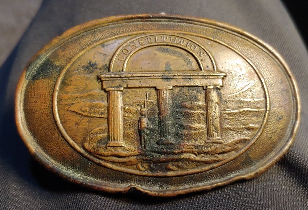 Georgia State Seal Oval Belt Buckle Civil War: Among the rarest of southern state waist belt plates are these Georgia plates. This is a marvelous Non-Dug belt buckle just as brought home from the war as a souvenir. Dead-real and very strong condit
