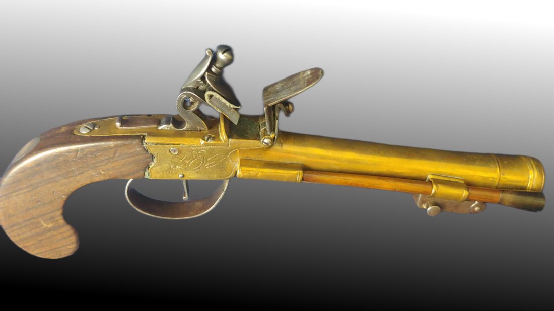 Flintlock bayonet pistol: Very appealing brass barrel flintlock pistol with switchblade style spring bayonet. Signed Wiliams. About 10 inches long not including the bayonet. 56 caliber. Overall NRA -Very Good condition. 100% o