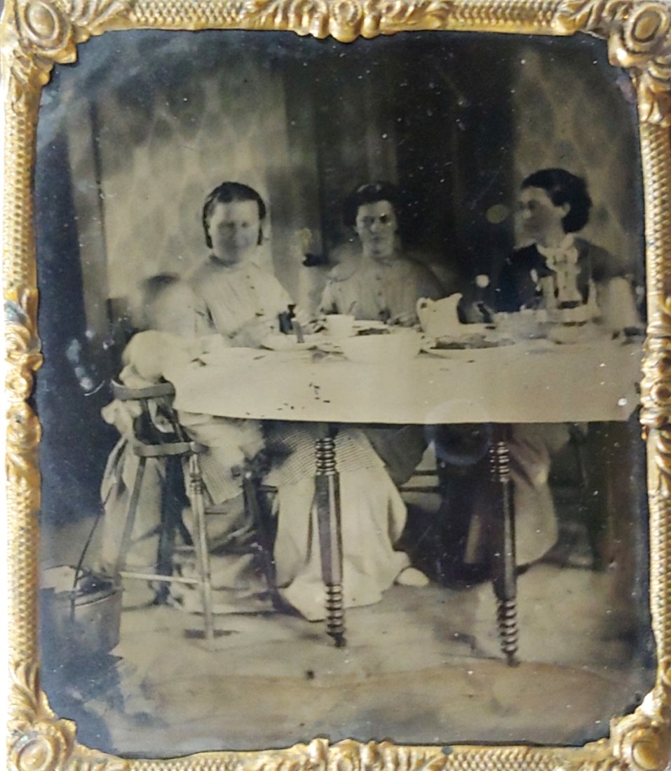 Civil War Tin type kitchen scene WOW: Here is a subject you have never seen before. An 1860s sixth plate tintype taken in an actual kitchen during a tea party. The photographer set his camera so it caught the front edge of a cast iron sto