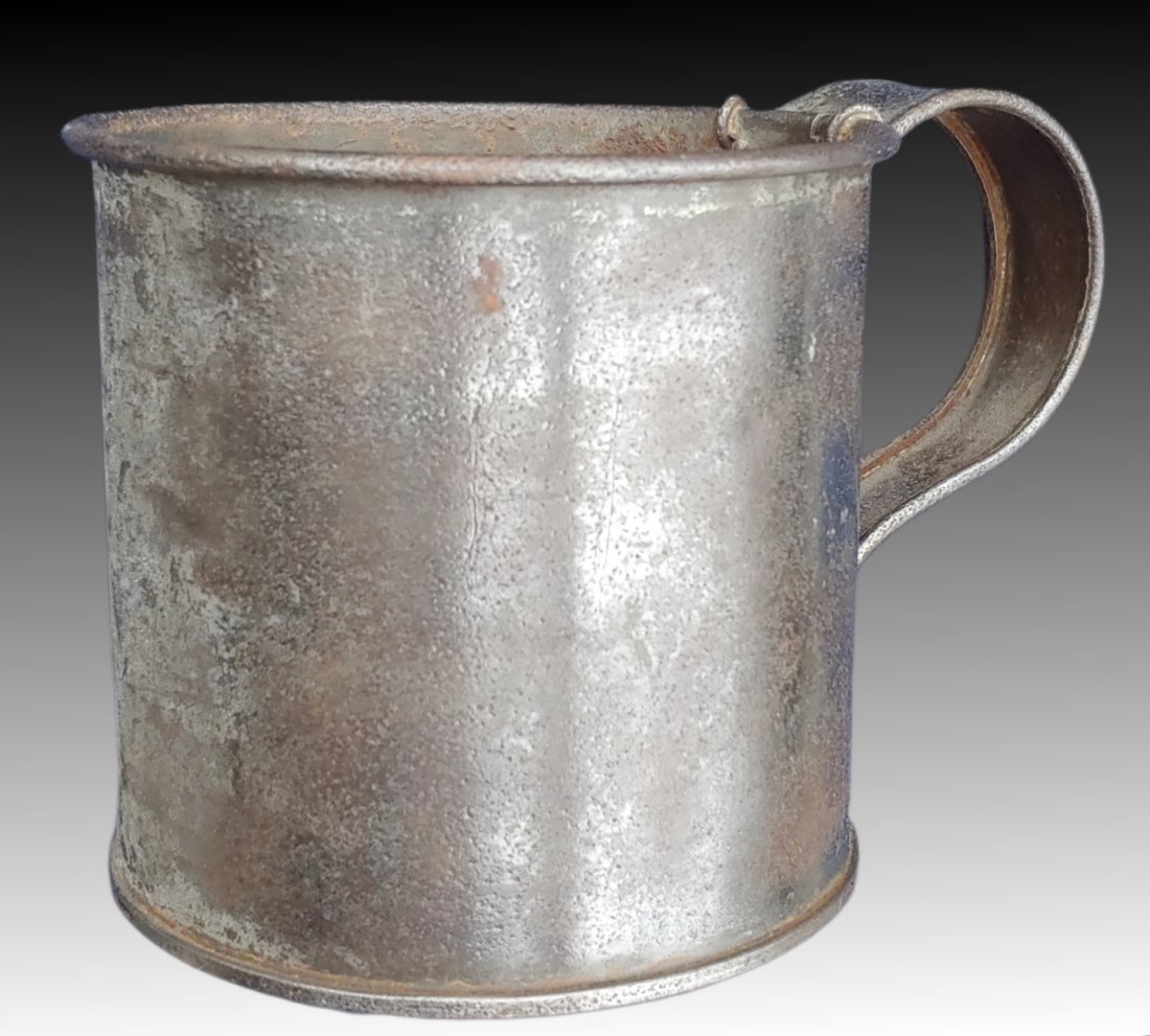 Civil War ssue cup: Regulation issue Civil War tin drinking cup. Holds a quart. Excellent condition. The real deal. As with all my items No Reserve. Materials, Packing, and Shipping is $17.00. Insurance is $1.50 per hund
