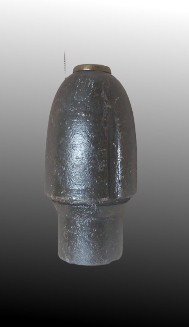 Civil War Hotchkiss Artillery Shell: A solid dug example of the bomb section of a 3 inch Hotchkiss shell. The sabot and base were blown free when it was fired. Has a brass Hotchkiss fuze adapter. I have never collected artillery shells n