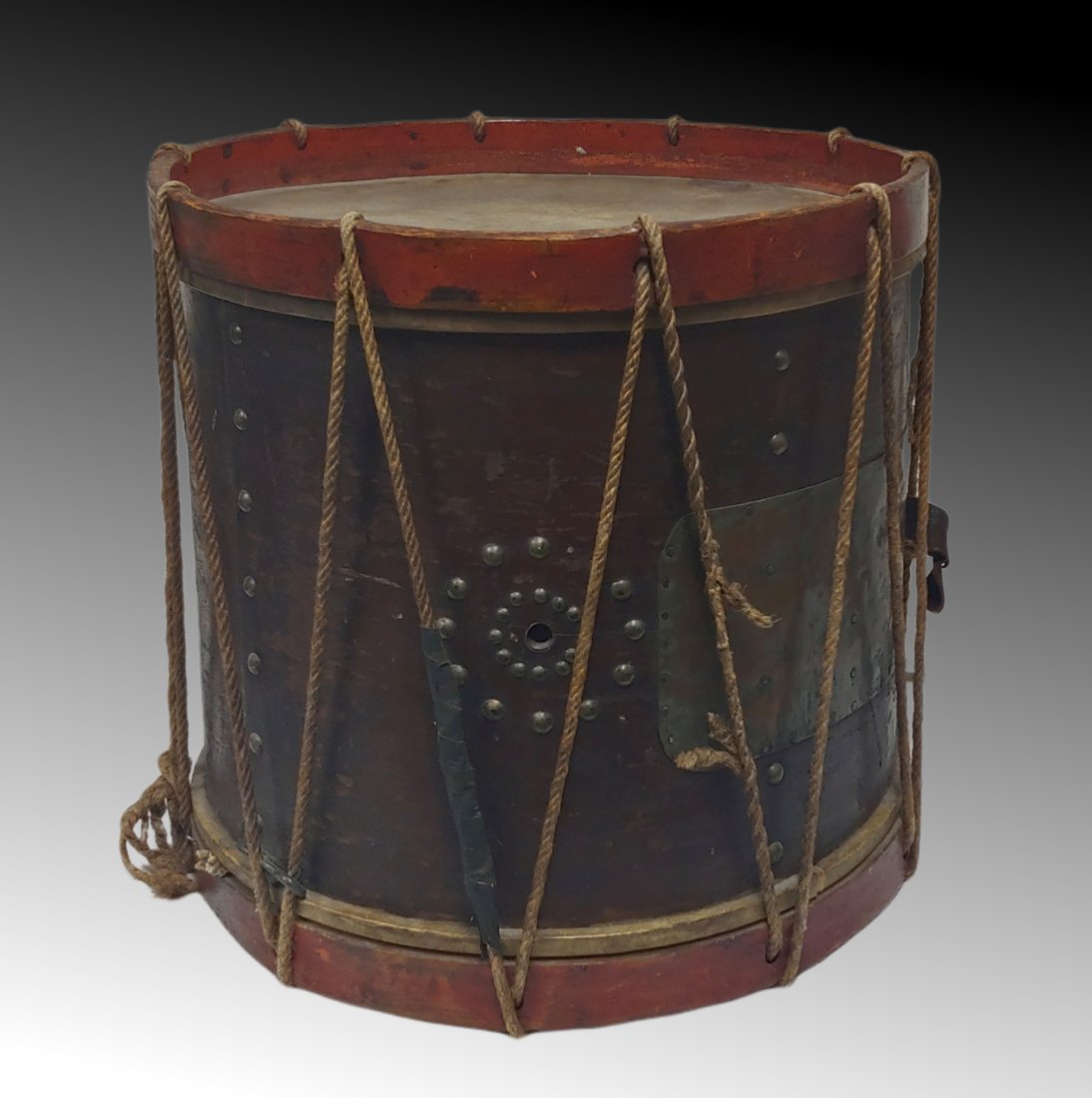 Battle Carried Civil War Drum: Really a handsome and ultra appealing CW drum. Regimental size, classic rope tension design. Best part is an ancient brass patch on the shell that has been there since the war. This repair fixed damag