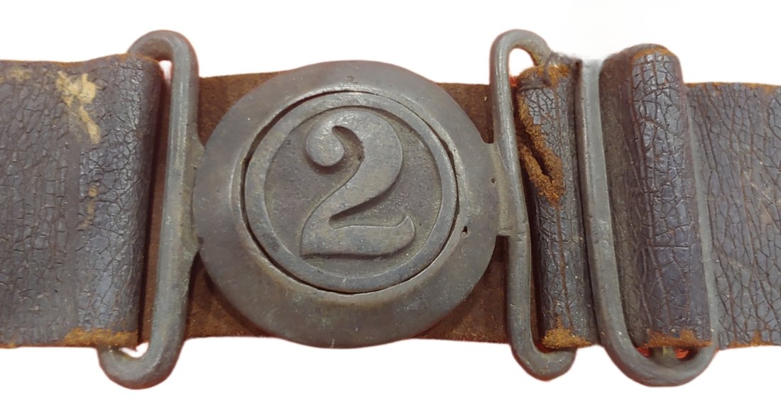 200-year-old fireman's belt and buckle: Magnificent, high quality 1830s era tarred leather Fire Fighters waist belt with heavy well finished interlocking tongue and wreath buckle. Faintly visible on the belt is the Hose Company name NEPTUNE