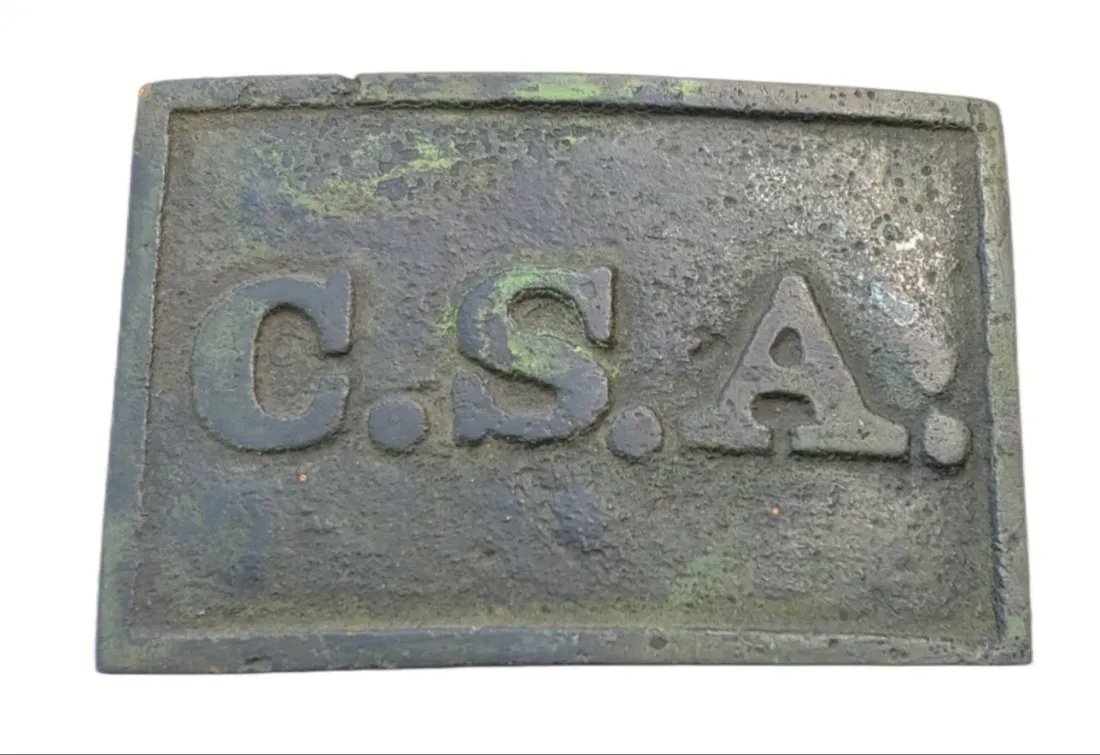 CSA Rectangular Belt Plate: The iconic Civil War Johnny Reb buckle, solid cast waist belt plate. "Dug"-found with a metal detector. Very solid. Both hooks are intact. The prong is missing much of its' hook... the reason clearly 