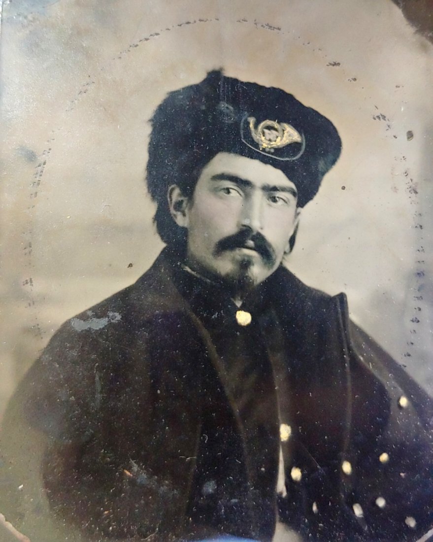 37th Ohio Civil War Ambrotype: Truly striking and sharp sixth plate ambrotype of a very charismatic subject. The infantry insignia appears to include the number 37. Collector L.M. Strayer found this in Summit County Ohio. Quite pos