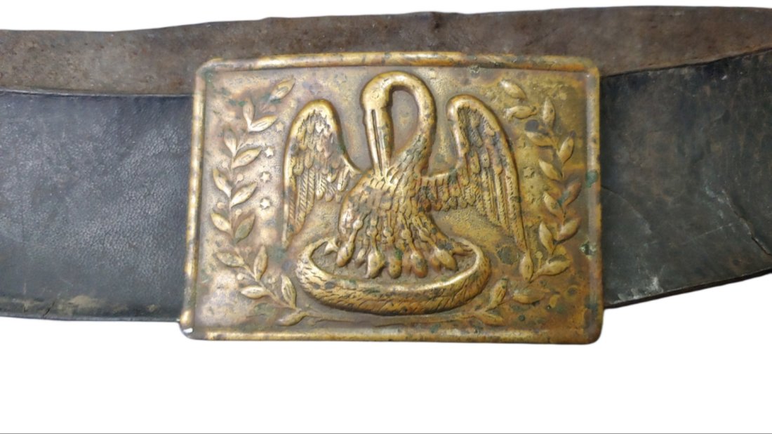Louisiana Confederate belt and buckle: An extreme rarity among Civil War buckles and plates. Dead-real and in excellent condition. This is the wartime produced rectangular Louisiana Pelican buckle in stamped brass with lead fill back and c