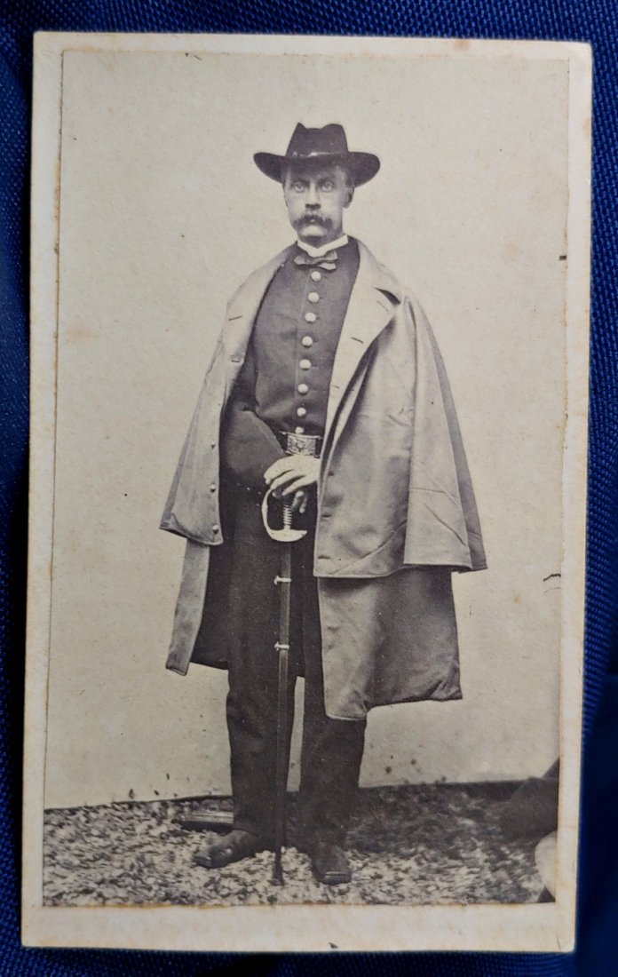 Civil War CDV photograph armed Union officer 1860 Staff Sword: Here is a weapon seldom shown in photographs of line officers. The straight blade model 1860 staff and field officer-s sword. The 1860 staff sword was adopted in August 1860, and Ames Manufacturing pr
