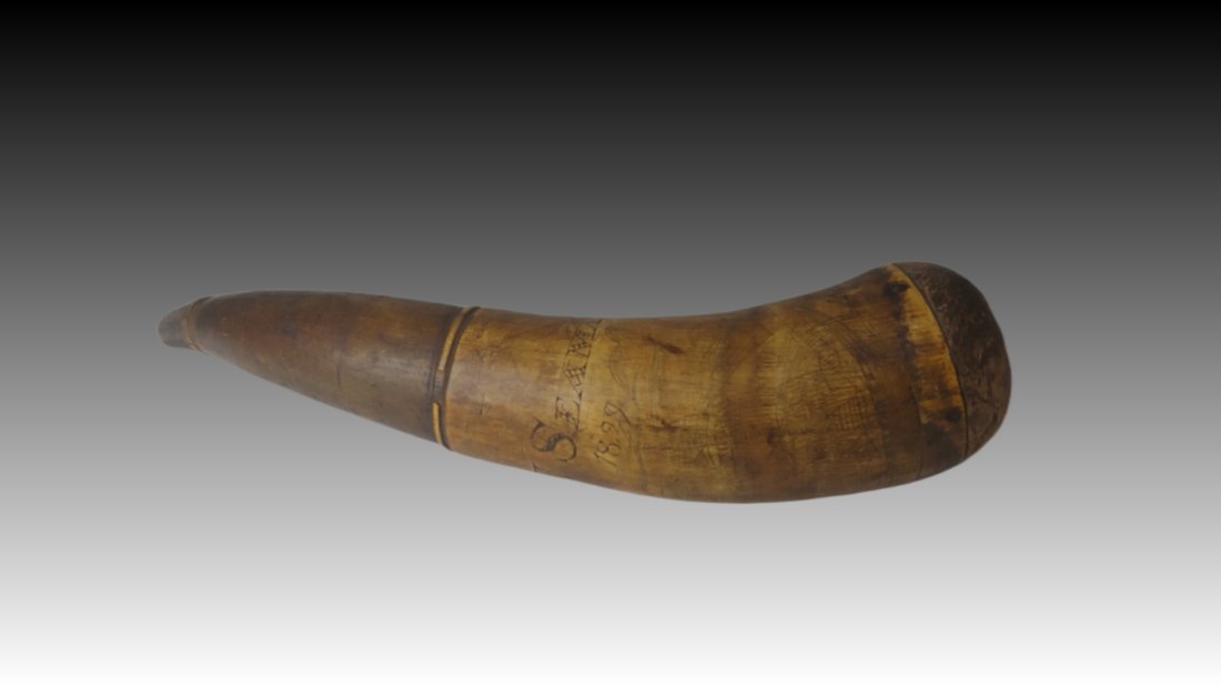 Scrimshaw American Navy Powder Horn: Really cool scrimshaw decorated powder horn. Bears the owner-s name J. SEAMAN and the date 1829. It is incise carved with several sailing ships, the most prominent of which is a large US war ship flyi