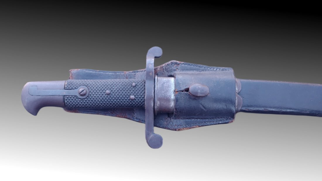 Civil War Enfield saber bayonet: English 1856 pattern saber bayonet and scabbard for the 2-Band Enfield sergeants rifle. Overall Very Good condition. 100% original, 100% complete. Blade is shiny steel, scabbard mounts are steel grey 