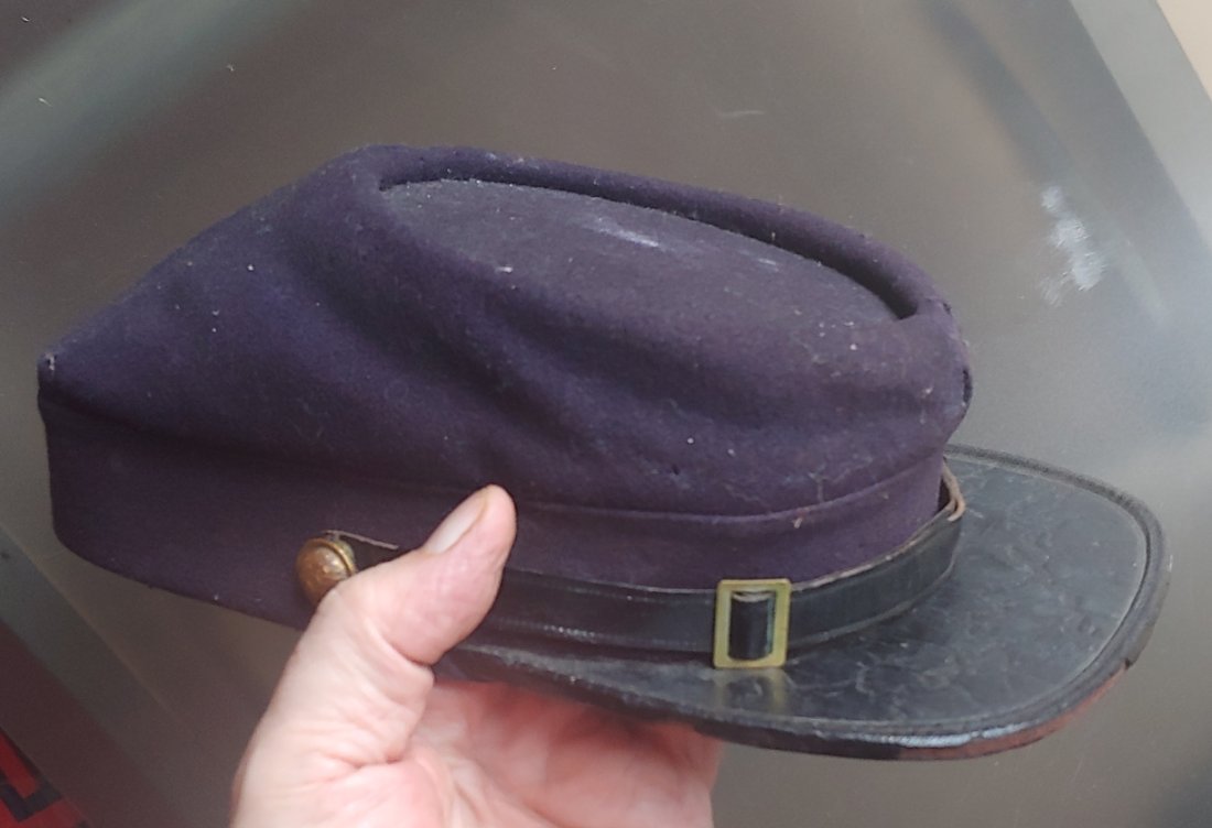 Indian War Officer's Kepi Uniform Cap: 1870s to 1880s US Army officer's uniform cap. Blue wool kepi, overall good condition, a few moth nips, and lacks the sweatband. Materials, Packing, and UPS Shipping on this item is $20.00. Insurance i
