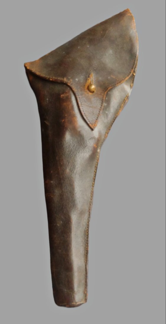 Highest Quality Civil War Officer's Lined holster: 1860s Commercial full flap holster for Colt Navy revolver. Single belt loop secured with two copper rivets. Edges of the cover flap are stitched around the edges securing the fine leather lining mater
