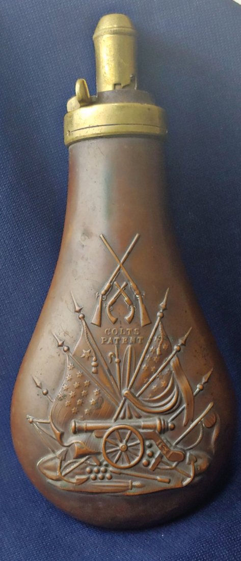 Colts patent powder flask: This is a top-notch, highest-quality, mid 20th century restrike by the famed Dixon flask company in Great Britain, done sometime after WW2. They have all the quality of the 19th century flasks, and ar