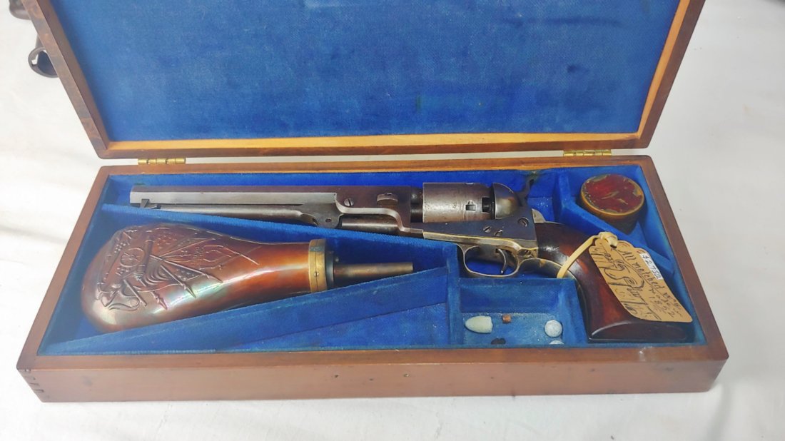 Wooden casing for Colt Navy: Very handsome and well constructed contemporary (20th century) wooden case for the model 1851 Colt Navy revolver. Has powder flask Etc included as shown. Revolver not included. Add $25.00 for material