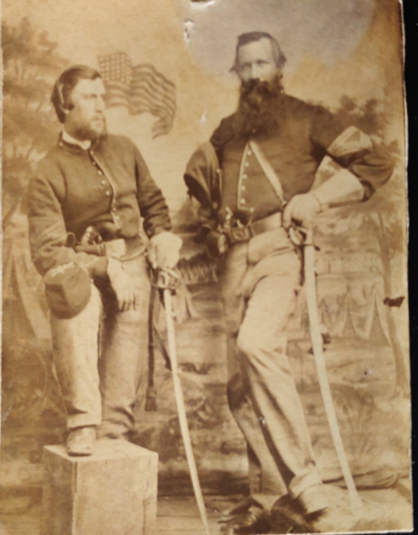 Exceptional Civil War CDV photo armed 13th NY cavalryman: One of the best CW carte de visite photos I have owned. Super pose, super subjects. Colt army revolvers, cavalry sabers, ammo or cracker box on the floor. Patriotic backdrop. Trimmed to sixth plate si