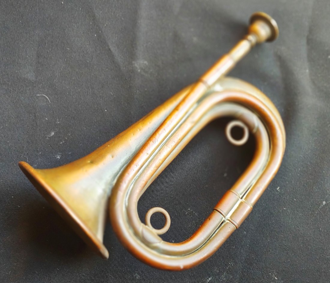 World War 1 Bugle 1917: Outstanding attic condition regulation US Army contract bugle from World War One wwi ww1. Perfect undisturbed age patina. Full contractor markings by Millard. Dated 1917. Note the clip art photo showi