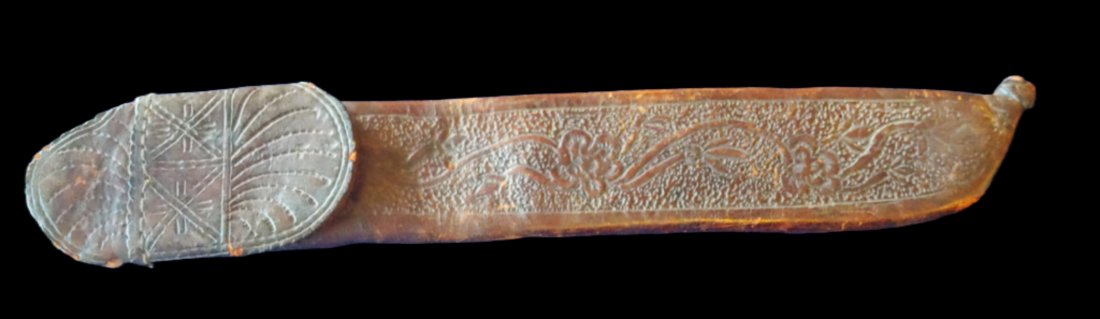 Antique Tooled leather Scabbard for machete: High quality tooling covers this brain tanned brown leather sheath / scabbard. It once carried a machete or bolo but I do not know the origin or precise age. It is certainly well over fifty years old,