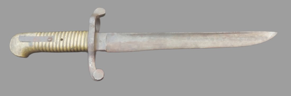 Colt revolving rifle bayonet turned into a fighting knife: This is a cut down saber bayonet marked S&K that was used with the M1855 Colt Revolving Rifle and the Brazilian Light Minie Rifle during the Civil War. It has been altered into a knife. Cowboy era? WW