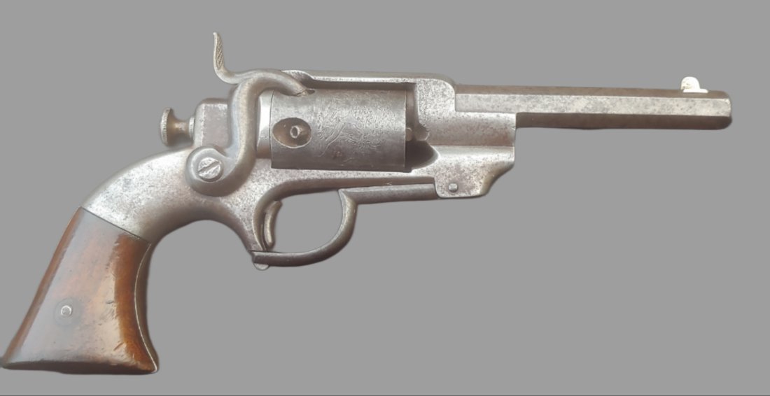 Allen and Wheelock side Hammer percussion revolver: Allen & Wheelock Side Hammer .31 caliber belt revolver. Barrel length roughly 5 inches. Cylinder scene is excellent. Action works perfectly. Grips are very good with no cracks or chips. This revolver 