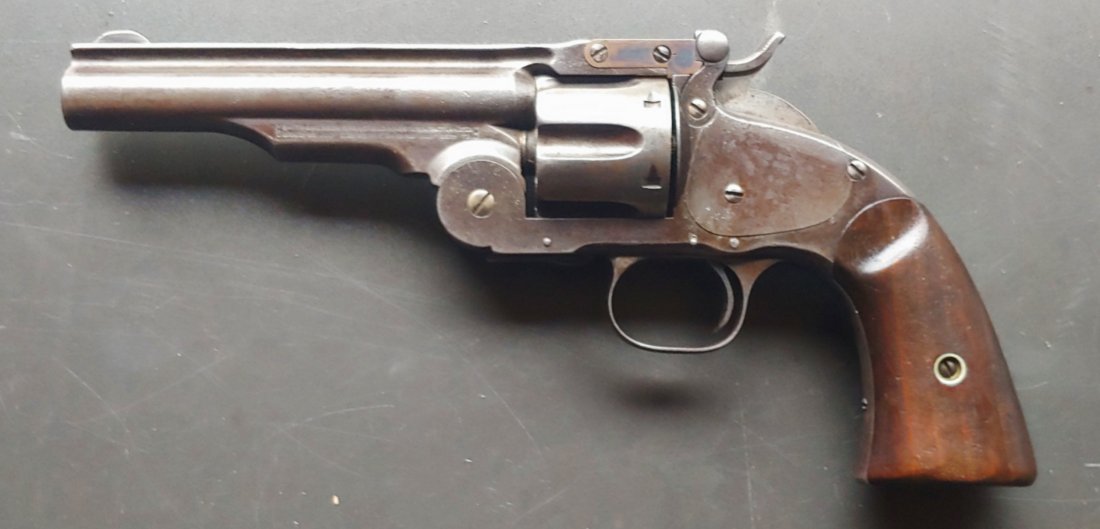 Wells Fargo marked Smith & Wesson Schofield revolver: This is one of the standard issue US cavalry Schofield army revolvers issued to Indian Fighters in the 1870s. Overall Very Good condition showing handling and wear, but no abuse. Mechanically function
