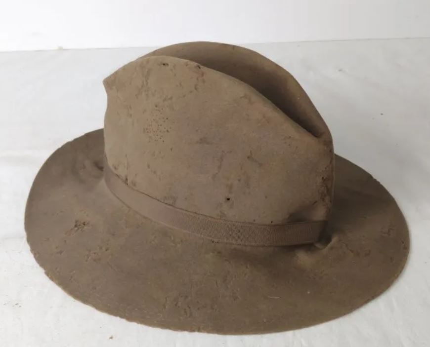 Spanish American War 8th us infantry campaign hat: Well worn US Army issue campaign hat from the Spanish American War and Phillipine insurrection. Visible on the side of the hat is a stenciled marking of crossed rifles over the number 8. 8th US Infant