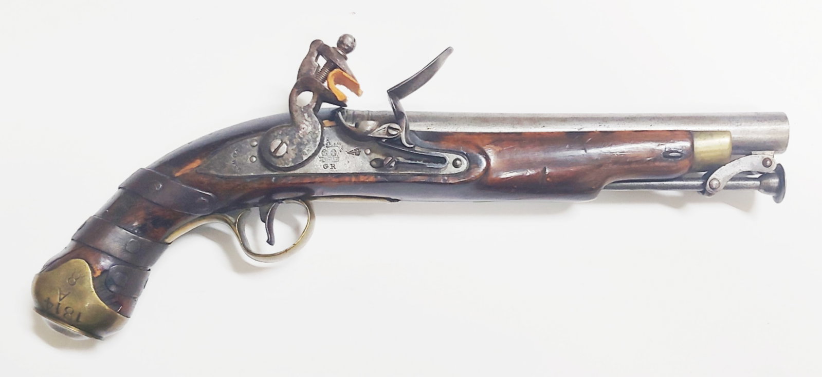 English Napoleonic and War of 1812 flintlock pistol: The standard British full stock flintlock New Land Pattern horse pistol fitted with the improved captured swivel ramrod which allowed the shooter to reload his pistol while mounted without worry of dr