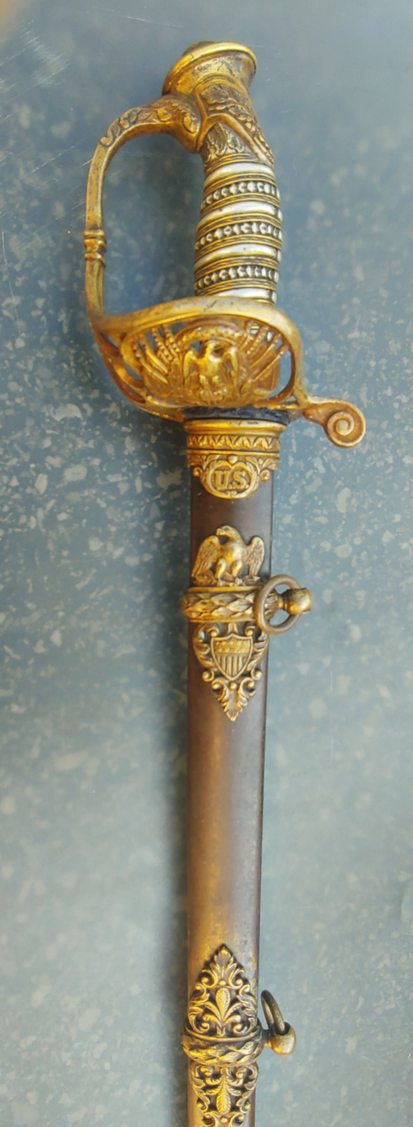 Presentation grade Emerson and silver staff officer sword and Scabbard: A very handsome example of the high end, presentation grade Union Army staff and field officer's sword . This one made and marked by The Firm of Emerson and silver in Trenton New Jersey. 100% original