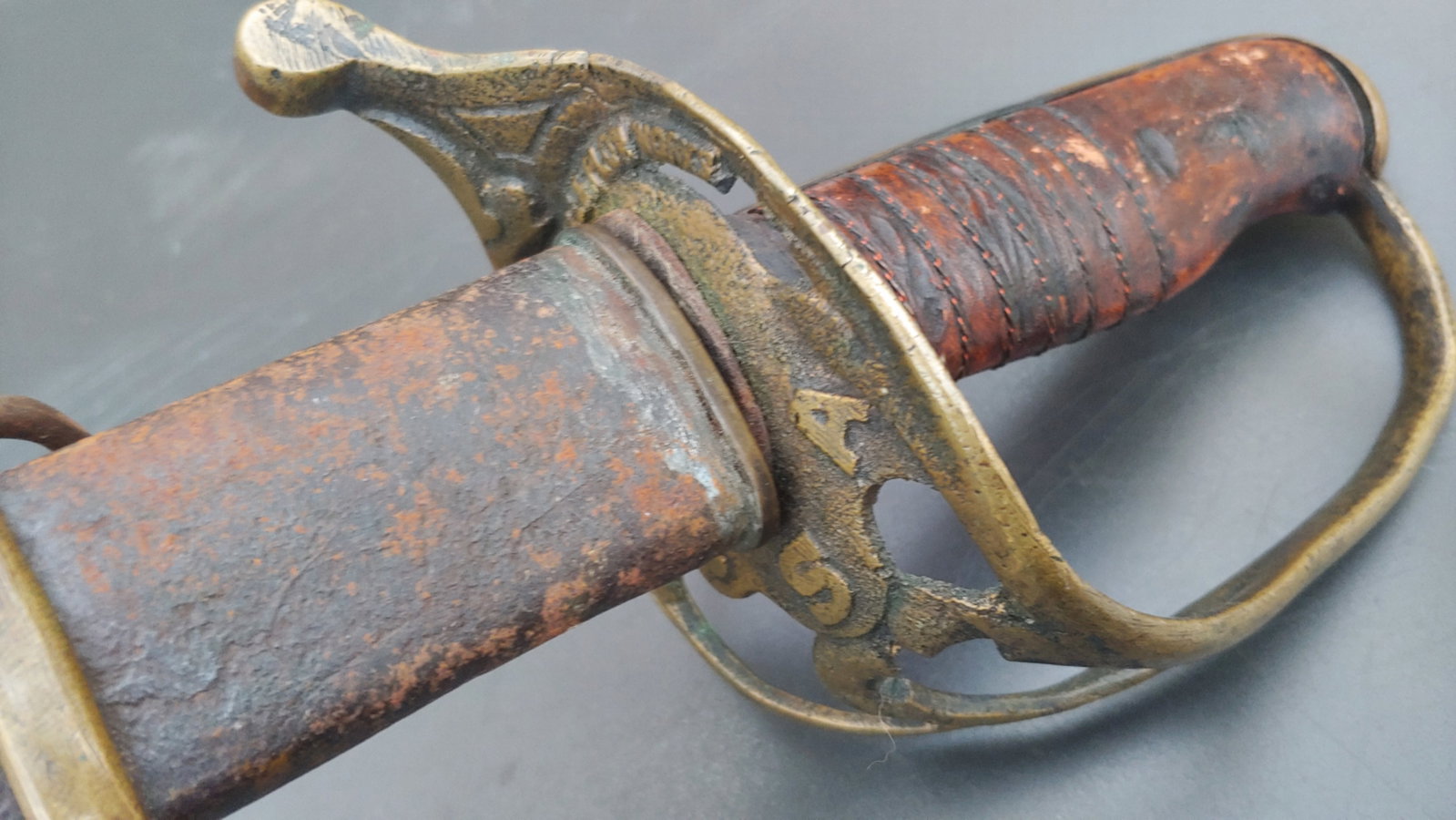 Confederate Nashville plow works saber and Scabbard: One of the Holy Grail Civil War Confederate swords. These Johnny Reb Cavalry officer's sabers were produced only during the short period between September 1861 and February 1862. After that the yanks 