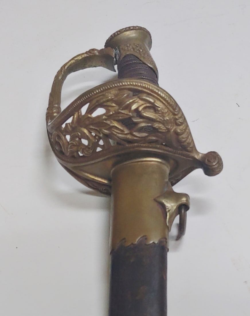 Handsome and unusual variant pattern Civil War officers sword: Higher quality than most Civil War officers swords . This one has a hybrid guard that is a cross between staff officers and foot officers . Top notch condition completely original and very solid . I d