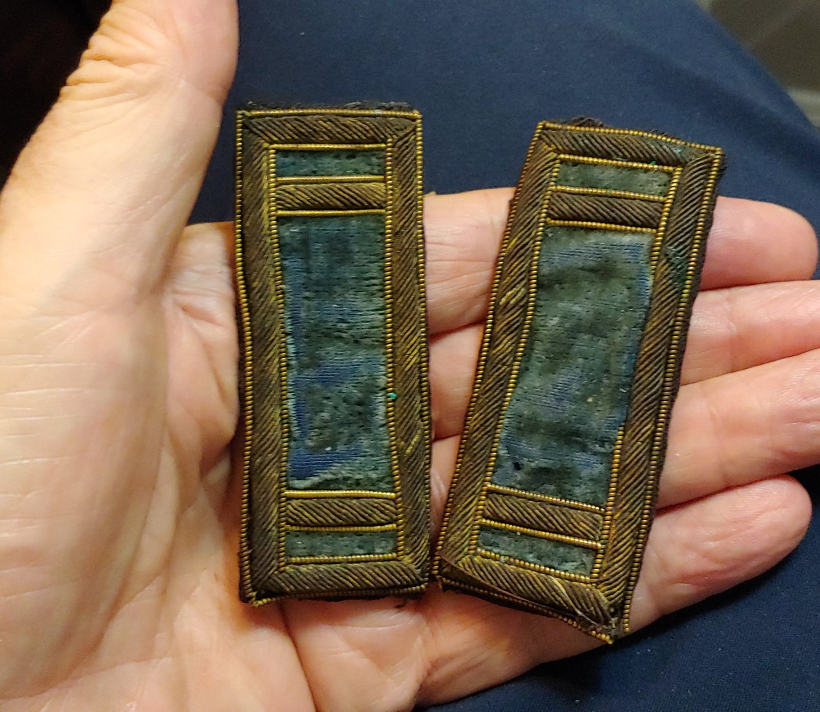 Civil War first lieutenant of infantry shoulder straps: A fine solid pair of velvet Center first lieutenant infantry shoulder straps . Unquestionably War date . Raw Back with all of the embroidery thread visible . Shows lightwear . Very handsome . $20 for 