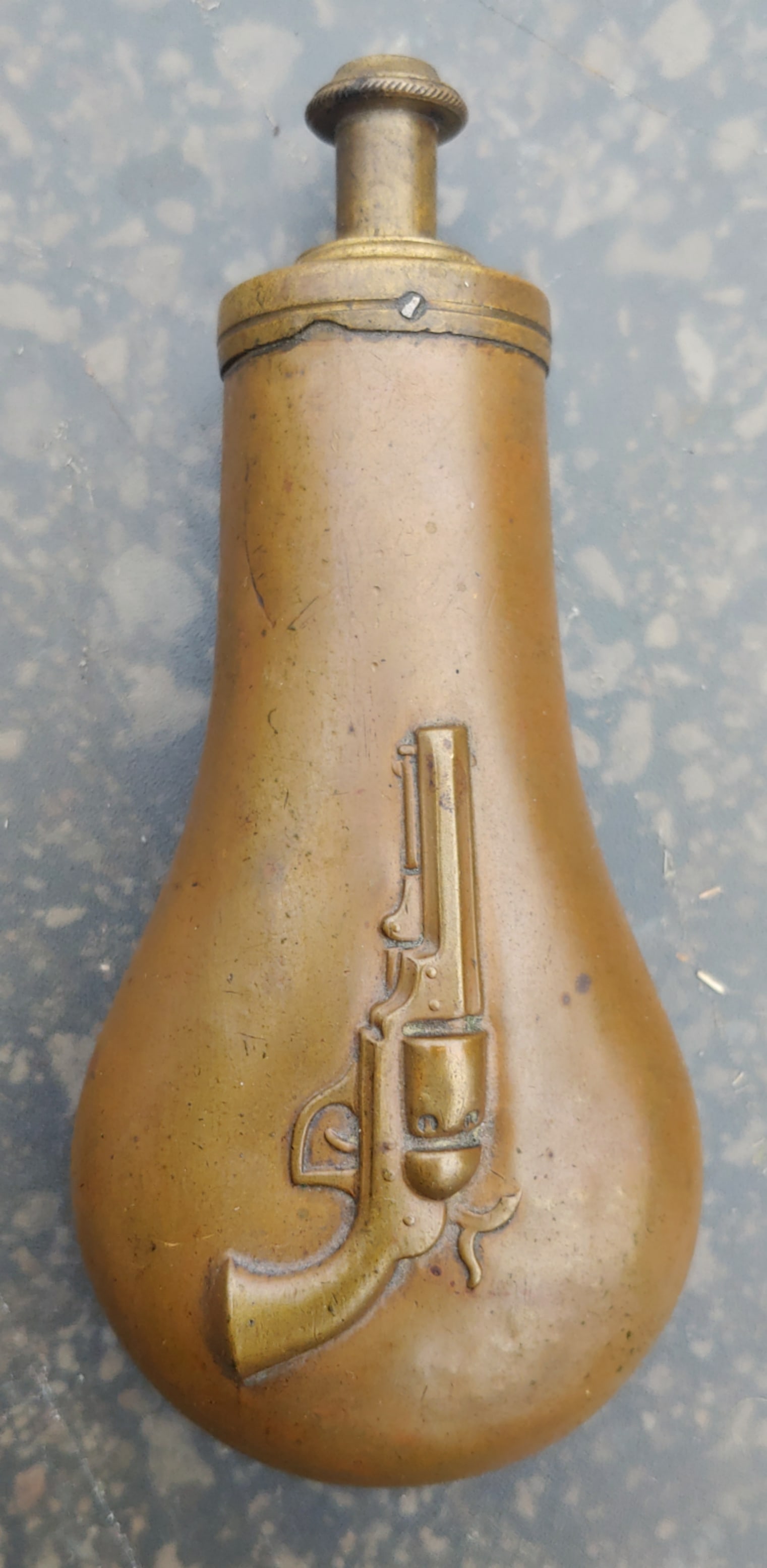 Holy Grail Colt percussion powder flask for baby Dragoon: One of the most enigmatic Colt powder flasks. Incredibly scarce, known by all Colt Collectors, but no one is completely certain which revolver this was intended for use with. The body is embossed with