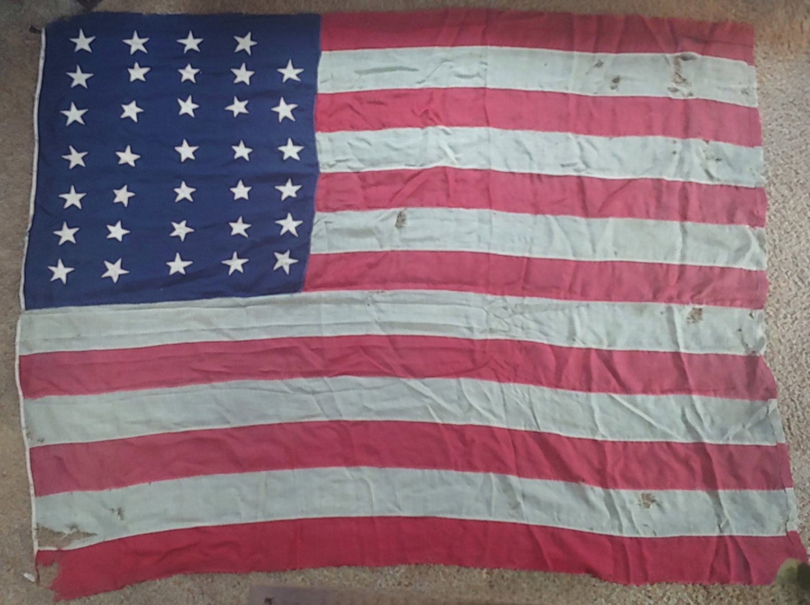 Civil War 34 star Gettysburg flag: This is a truly scarce and important civil war flag. We know just by looking at it that it was flying during the Battle of Gettysburg. This is not to say it was definitely on the field of battle thoug