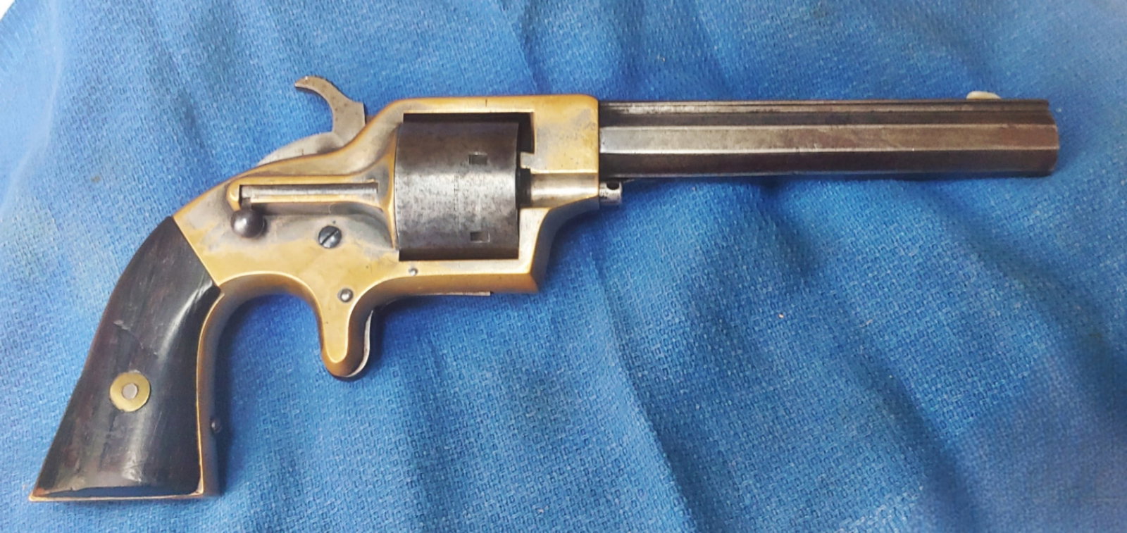 Civil War plant revolver: A very solid example of the brass frame .42 caliber Plant cupfire cartridge revolver . Mechanically perfect , totally original except for the replaced cylinder pin AKA Arbor. This is the third model, 