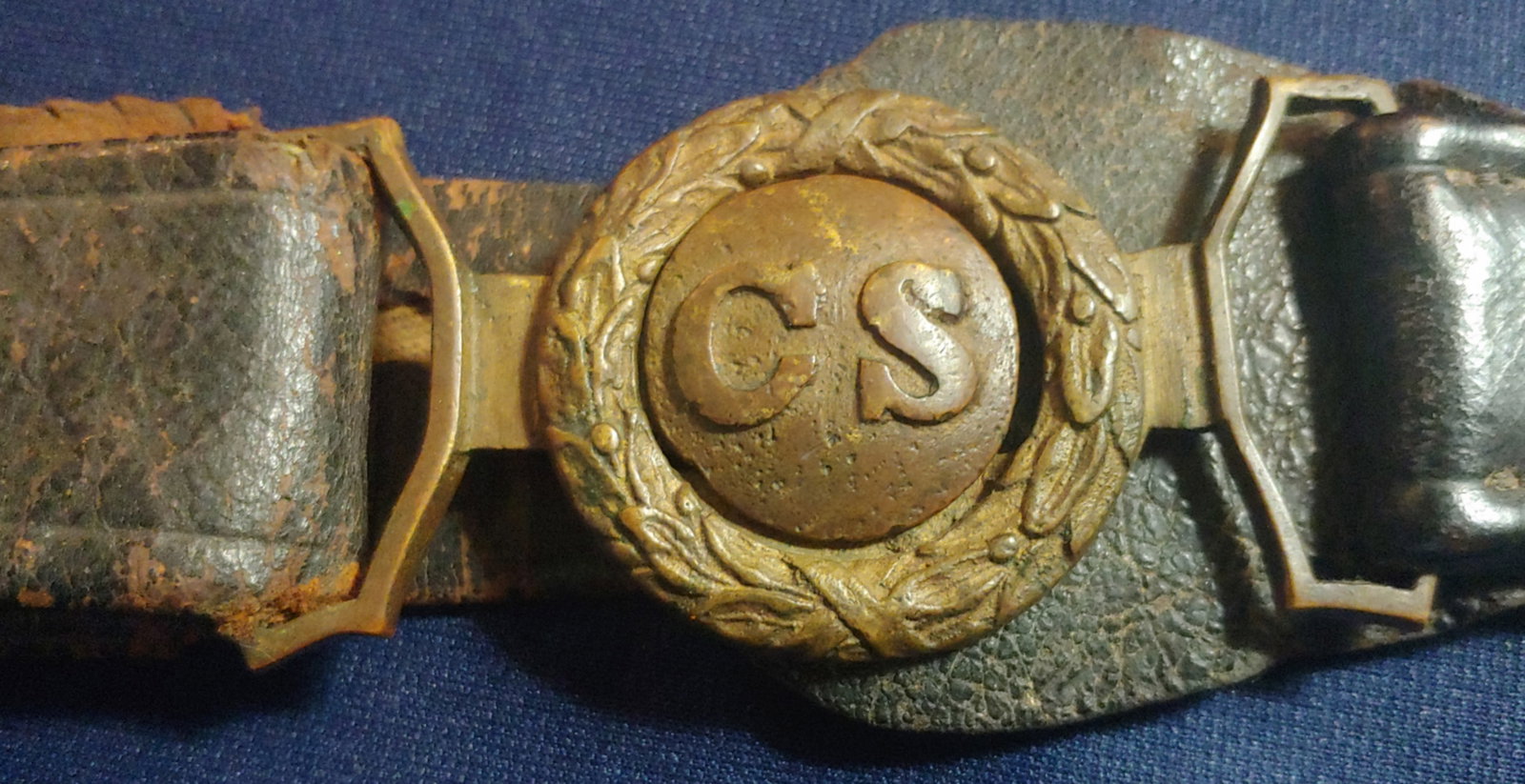 Confederate officers CS 2 piece interlocking buckle on the original belt.: This belt is 100% Johnny Reb Confederate from one end to the other. The Buckle has always been on this leather. The plate has a magnificent, truly beautiful deep bronze color patina and wonderful deta