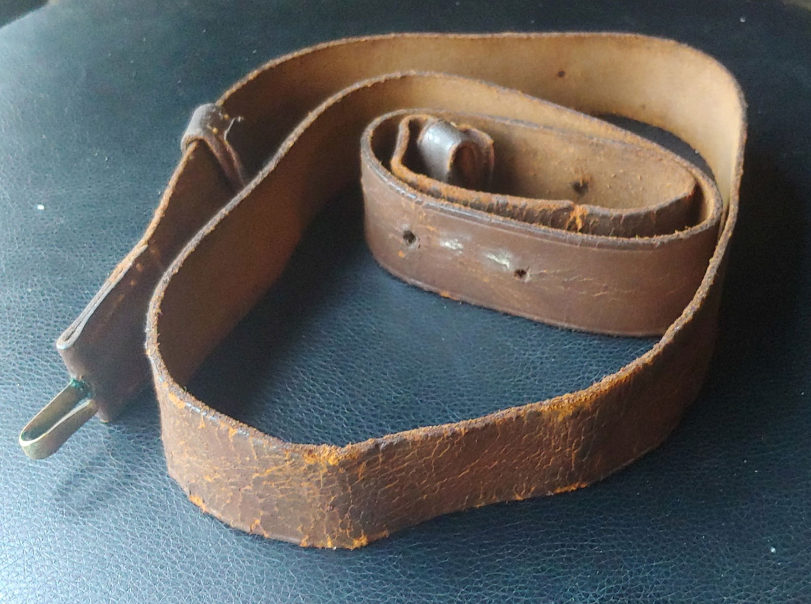 Civil War musket sling maker marked and inspected complete: A very nice brown russet leather Civil War musket sling that I just removed from an 1862 dated Providence Tool Company musket . It Is nicely marked with a Crossman maker stamp as well as an oval us in