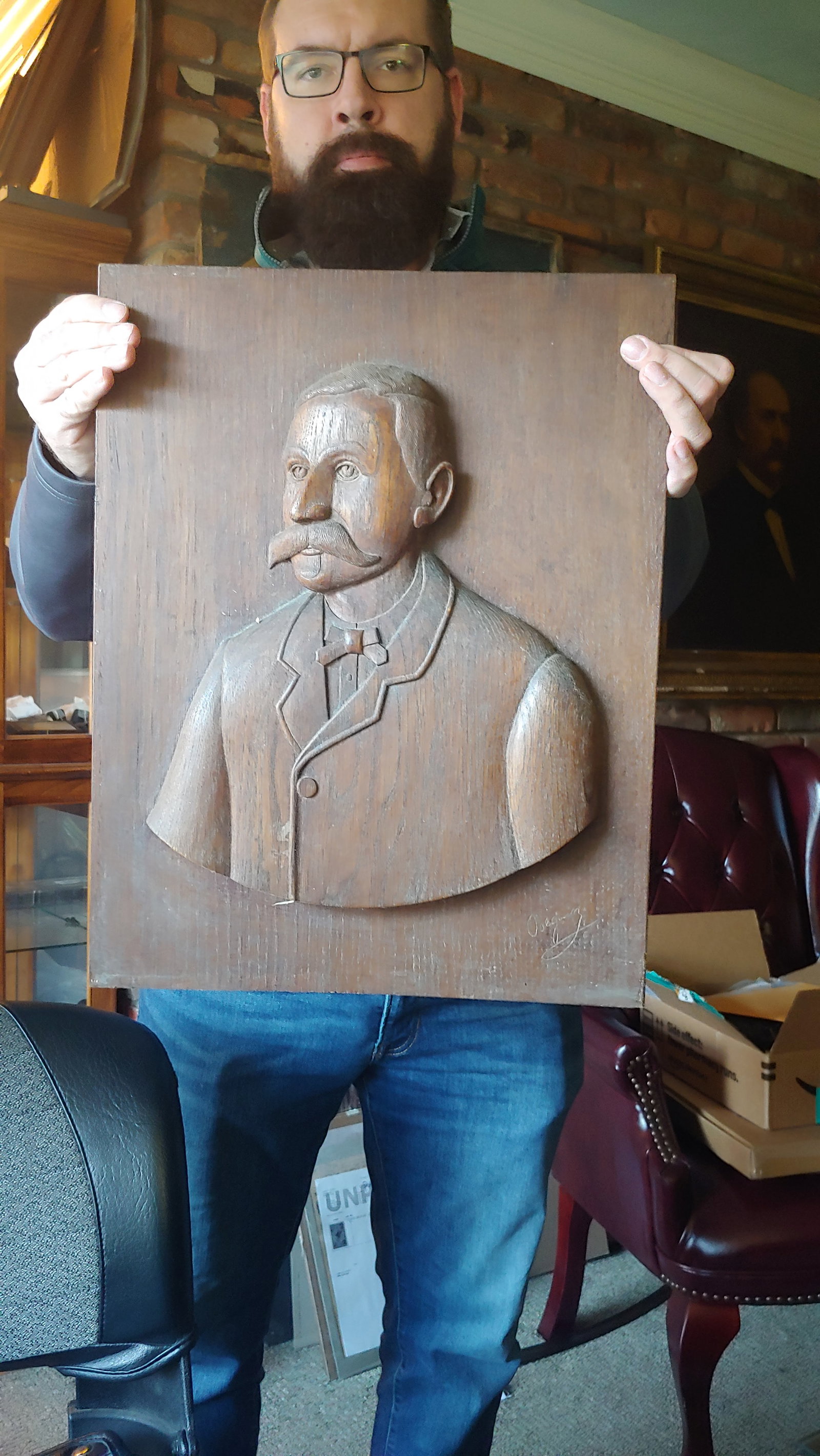 Big mustache relief carved portrait Western man: A very fine late 19th century carved bust likeness of an old codger with a Wyatt Earp style mustache . I don't know who he is but he looks great hanging on the wall . $35 for packing UPS shipping, and