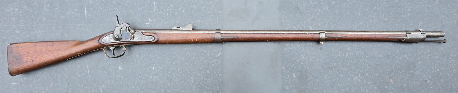 12th Indiana Soldier carved and identified Civil War musket: A wonderfully identified Remington Maynard tape primer conversion of the 1816 musket with a long range rear sight. While in the field the soldier carved his name and unit into the left side of the sto