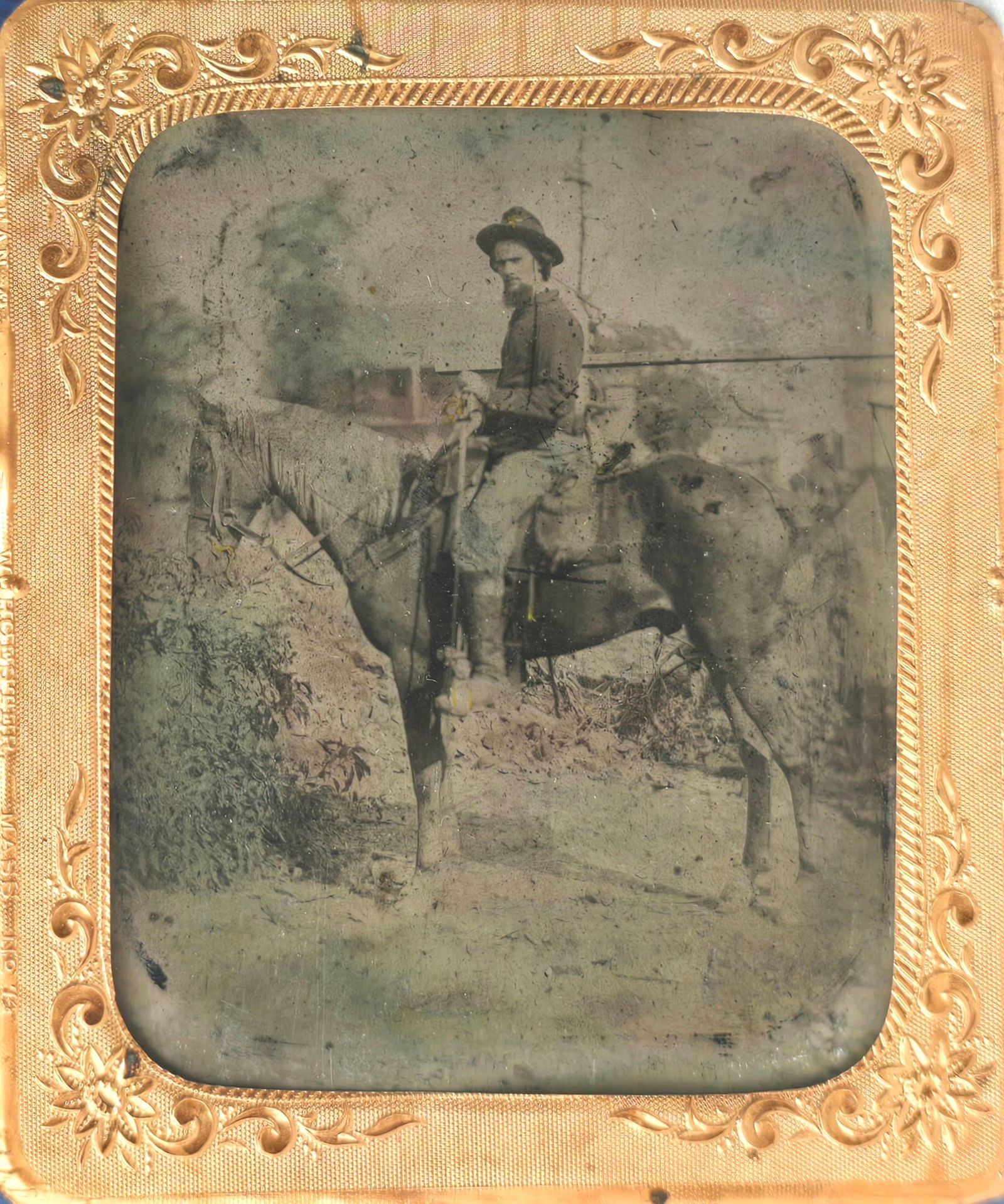 Rare Outdoor Civil War Tintype Cavalryman on Horseback: Cool sixth plate tintype of a Western Theater Union Cavalryman shown full profile astride his trusty steed. Our yank sports a 4-button fatigue blouse, black slouch hat, knee high boots, and some rakis