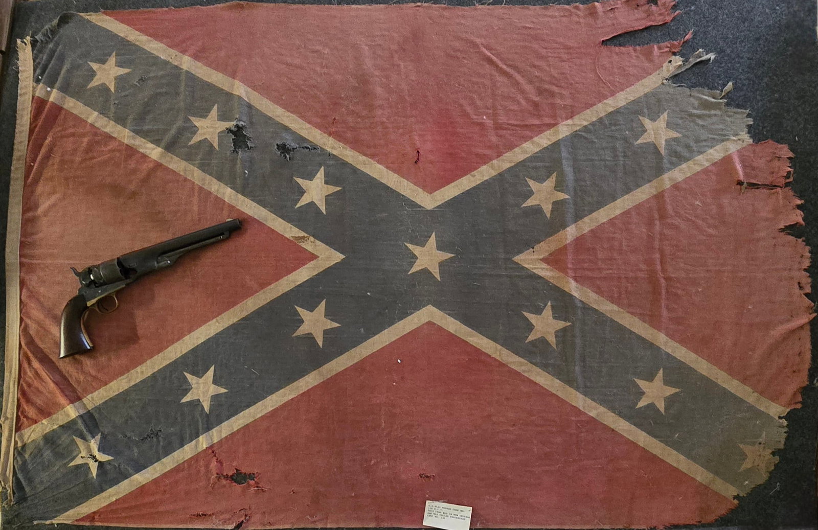 New Orleans Related Confederate Flag: A very handsome and striking UCV Confederate Battle Flag from the United Confederate Veteran's Post # 130 in New Orleans. The flag is so marked on the edge and it is also stated on a typed tag from th