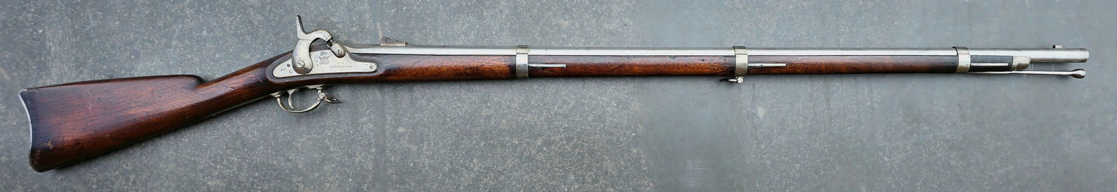 Civil War 1861 Springfield Rifle Musket: A genuine 1861 Springfield rifle musket actually made at Springfield... Not a contract 1861 musket . Very sharp condition. The wood has strong edges and a very attractive grain and color. The metal is