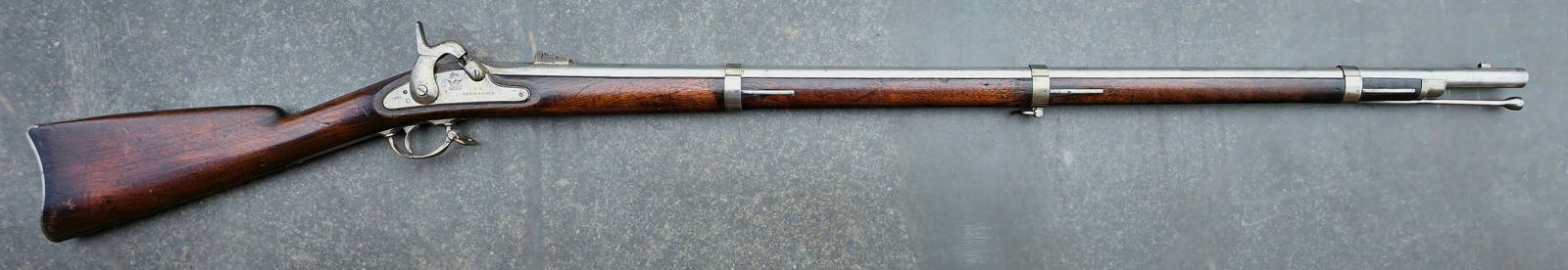 Civil War 1861 Springfield Rifle Musket: A genuine 1861 Springfield rifle musket actually made at Springfield... Not a contract 1861 musket . Very sharp condition. The wood has strong edges and a very attractive grain and color. The metal