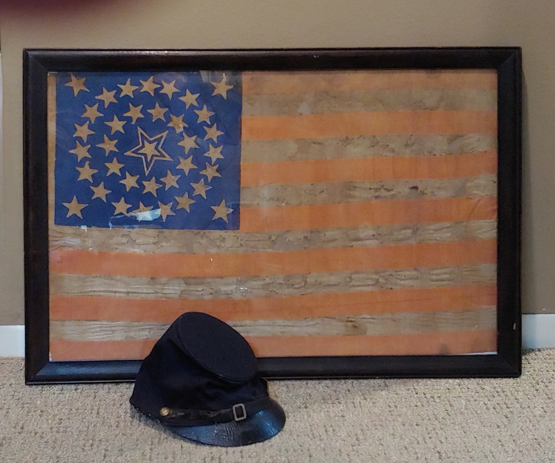 Framed Civil War 35 star flag fancy Canton: A very handsome and striking civil war flag framed and ready to display. Frame is 30 x 22 inches. This is printed red white and blue on what appears to be muslin. The blue Canton has 35 Stars arranged