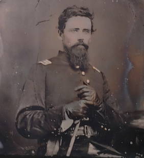 Tintype Civil War Surgeon With Surgical Gear: A very striking sixth plate image with a lot of hidden detail. When I first found this I thought it was an officer in mourning. But the more I looked the more I found. Look closely and you will see