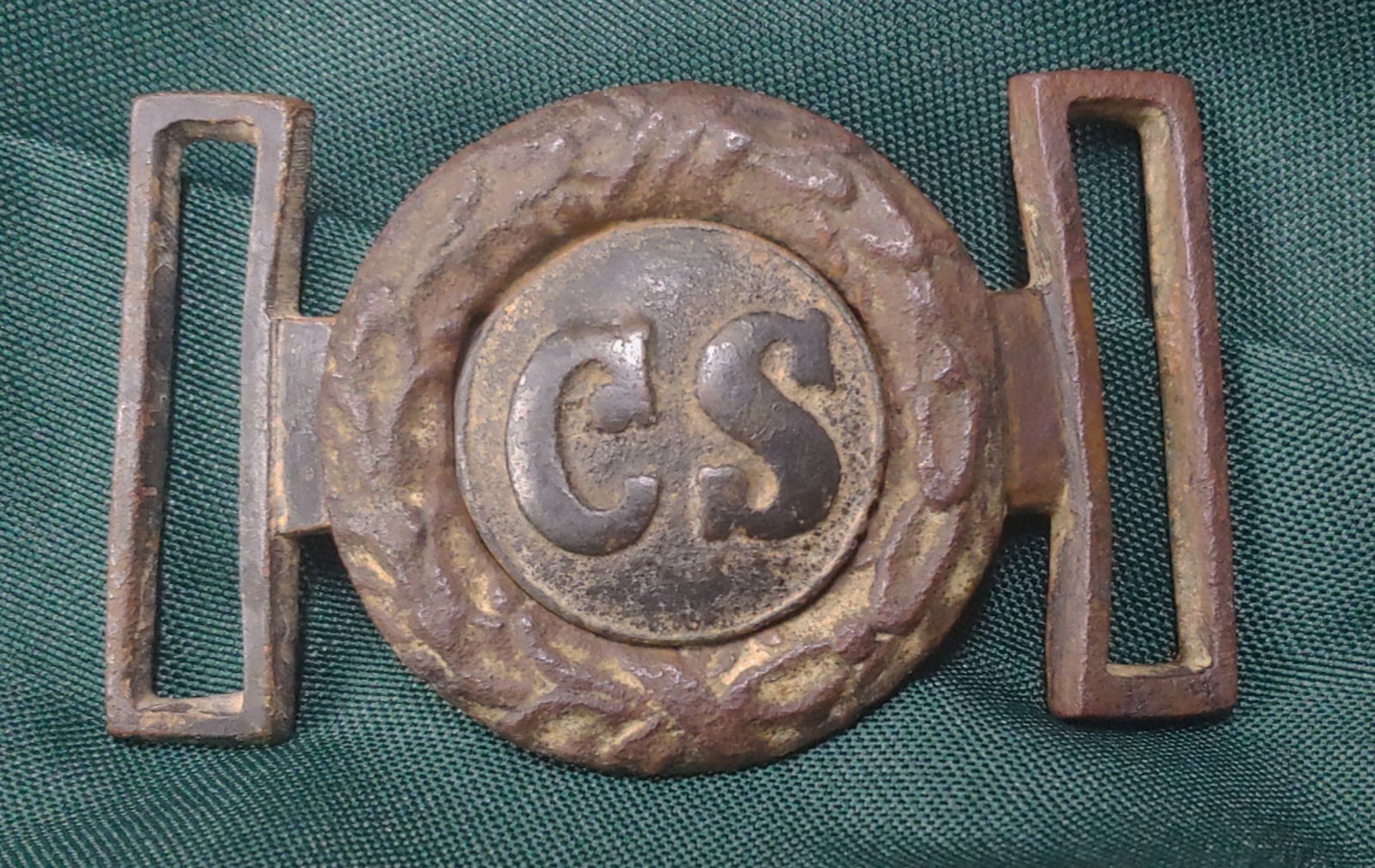 Beautiful Confederate CS 2-pc Buckle Gettysburg campaign: This Confederate two-piece interlocking sword belt plate is absolutely beautiful. It is one of the Richmond patterns with pronounced serifs on the letters. No damage, no repairs, undisturbed original