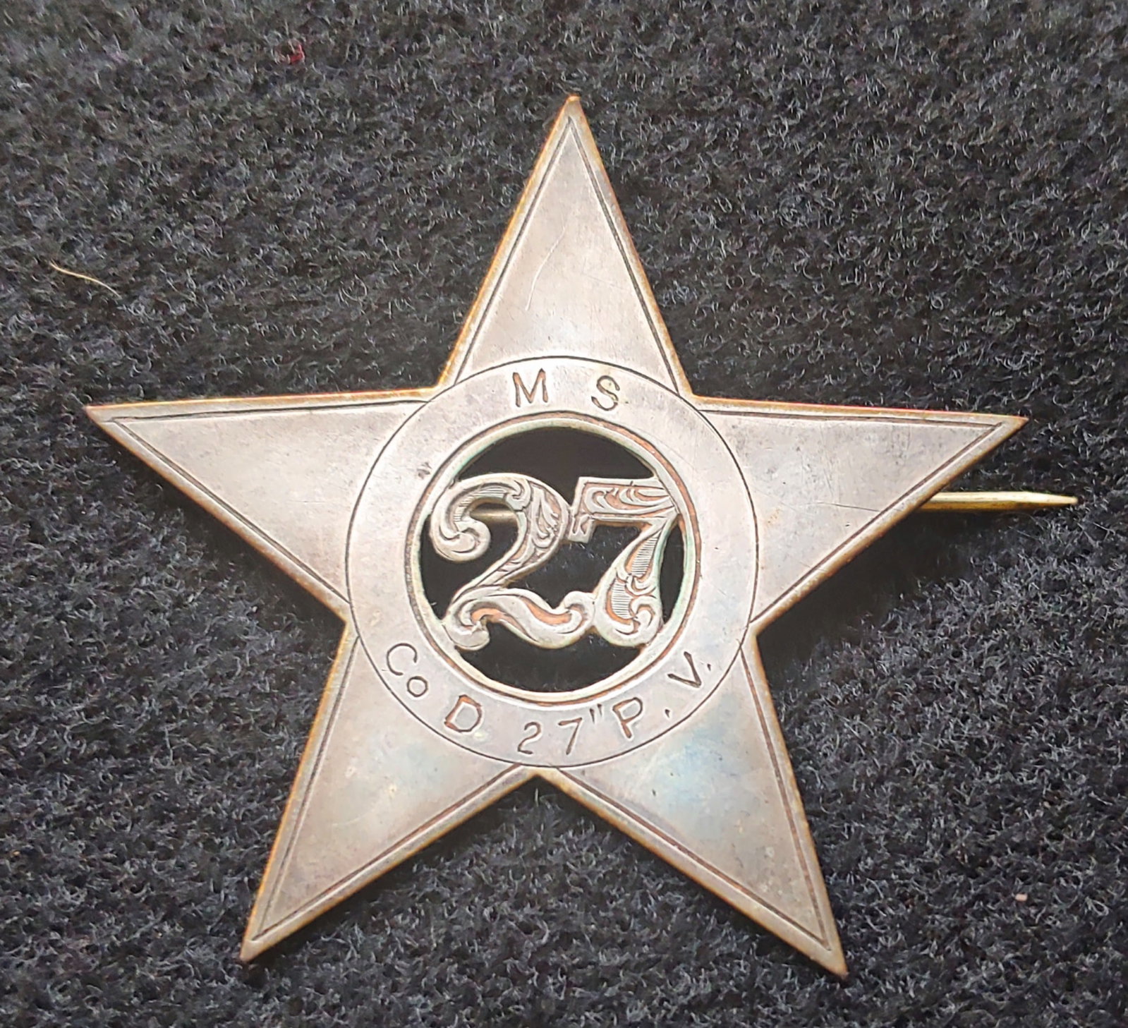 GETTYSBURG! Large size 27th Pennsylvania silver 12th-20th Corps Badge: A fine large silver corps badge measuring 2 inches across. Ultra desirable form with silhouette cut out numerals 27 in the center of the badge . Nicely engraved is M.S. CO. D 27TH P.V. `Our soldier is