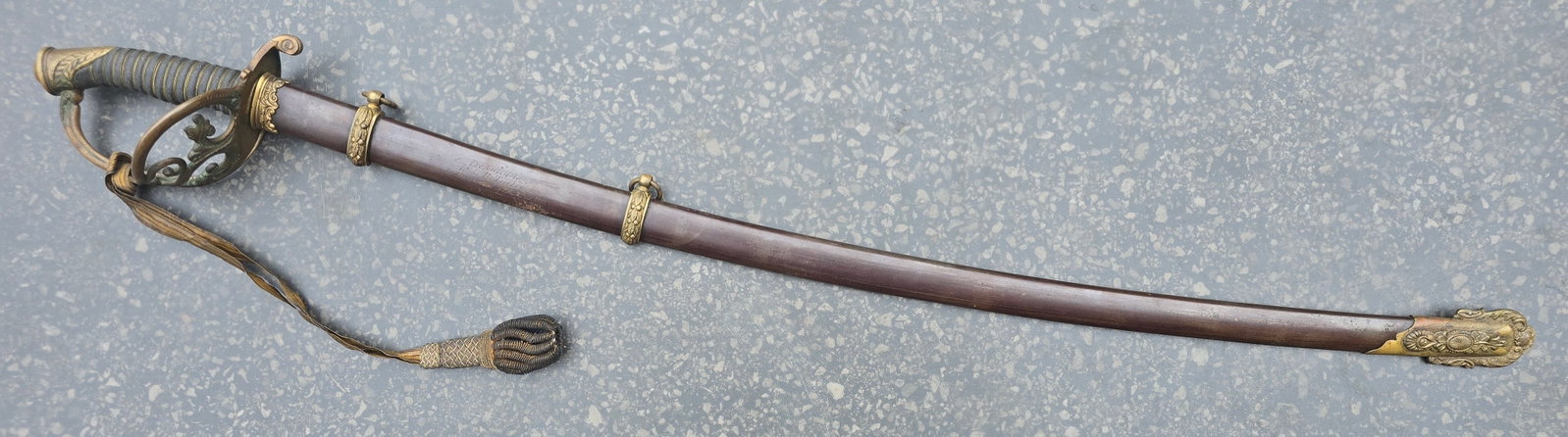 Top Shelf 3rd Ohio Cavalry Presentation Sword.- Superb: A truly top shelf presentation grade Cavalry Officer's saber and scabbard presented to and carried by Lewis B. Tooker 20 years old.Enlisted on 9/4/1861 as a Priv. On 9/4/1861, he mustered into "A" Co.