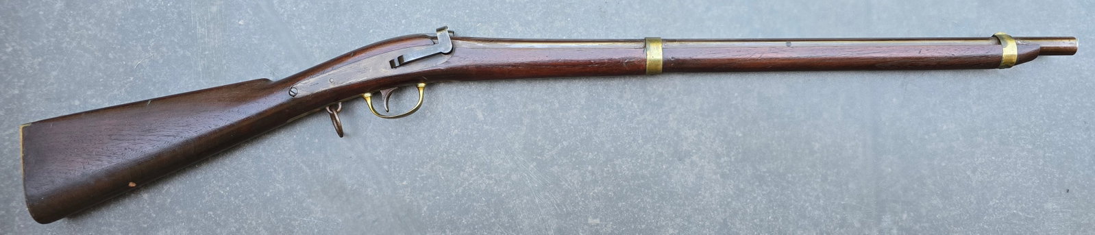 Fine condition High finish Jenks carbine: I will be fine-tuning this description on the computer shortly. Fine condition breech loading Jenks Navy and Cavalry carbine. Overall fine condition retaining the bulk of the original lacquer brown fi