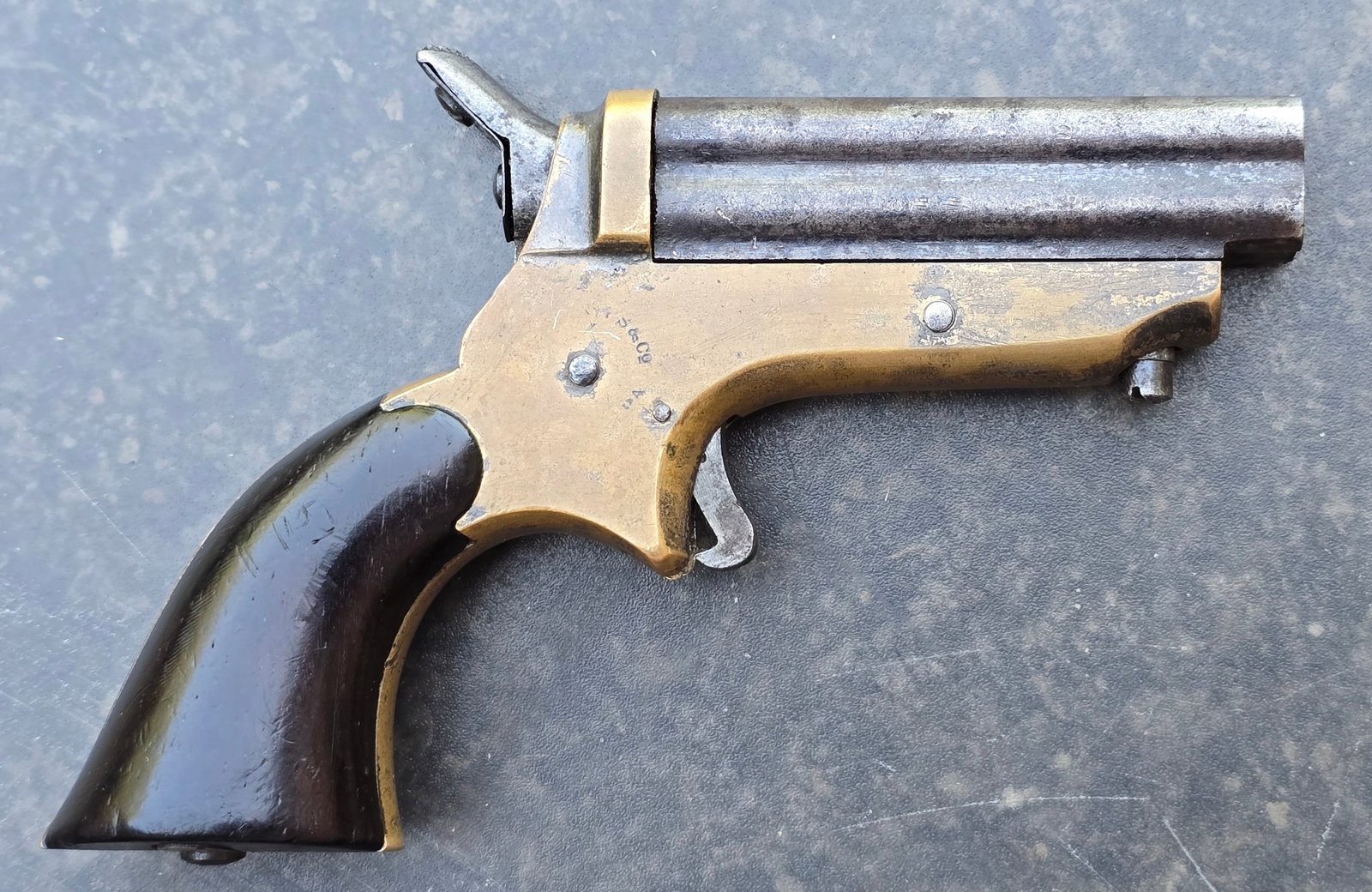 Project Gun Sharps Pepperbox: 22 caliber four barrel Sharps pepperbox. Refinished and not functioning. $25 for packing UPS shipping, and Signature Required service. UPS charges $7 to obtain a signature. Insurance is $2.00 per $100