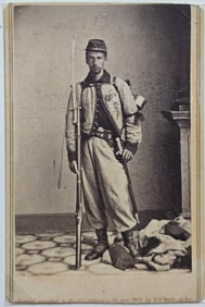 Brady CDV of Brownell wearing his zouave uniform and holding his rifle