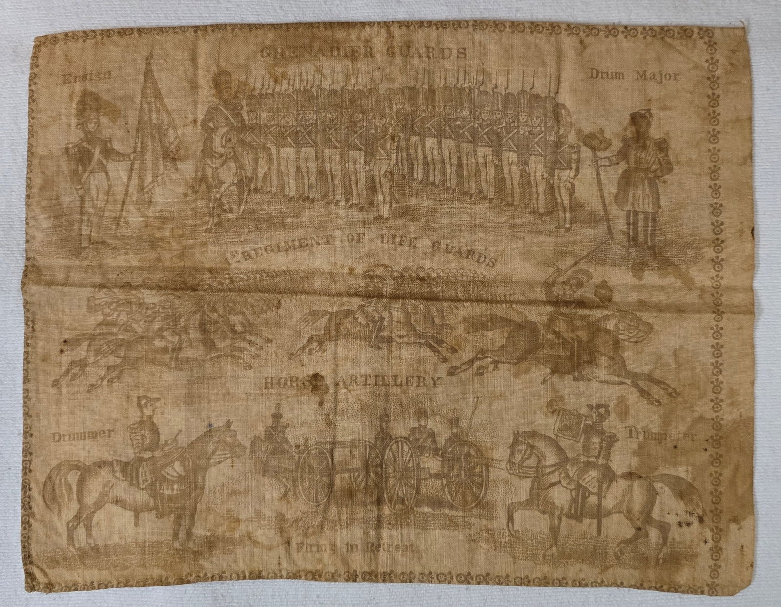 Military Handkerchief Crimean War or Earlier: Near 200 year old textile print handkerchief depicting British military units and personnel from the 19th century.It is divided into two main scenes.Top Section...The main illustration shows an infant